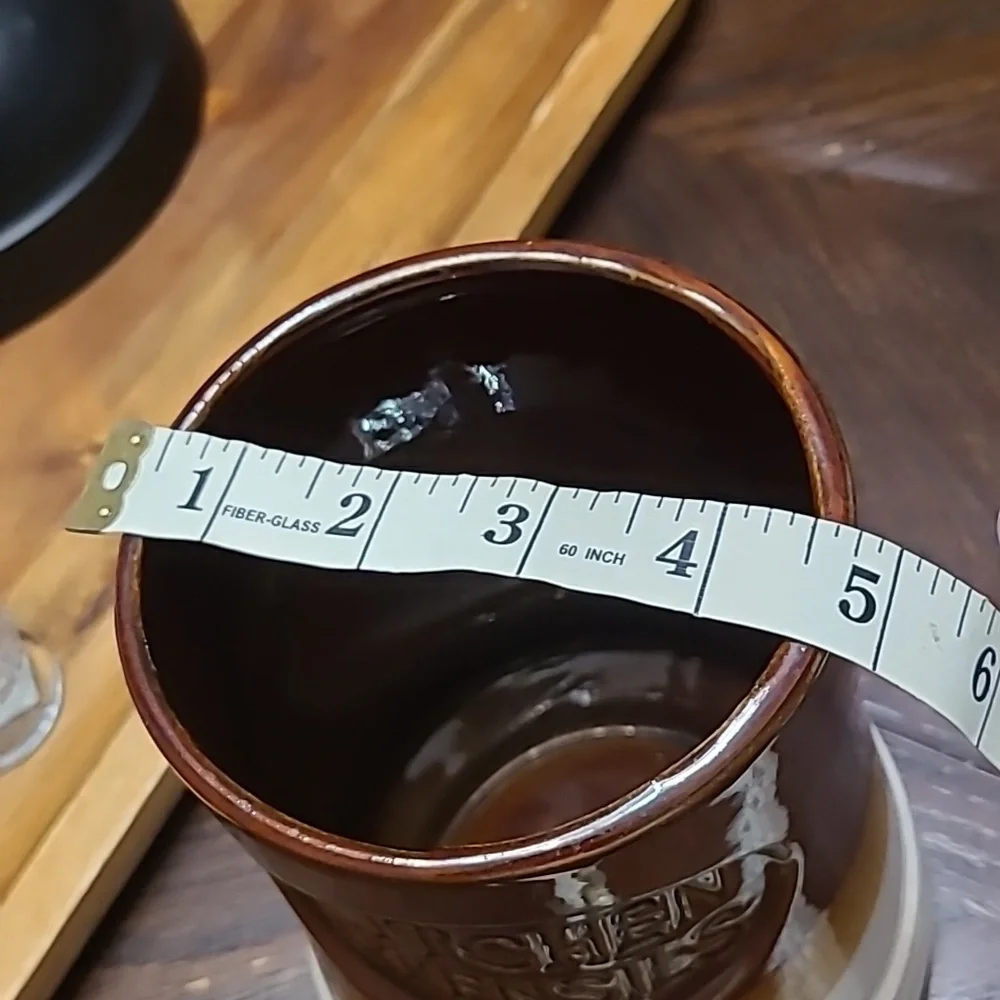 Vintage kitchen utensils holder.